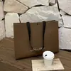 Tienda de Ropa Bolsas de Mano No Tejidas para Ropa de Mujer Empaque de Regalo Correas de Mano con Asa al Hombro Bolsas de Compras al por Mayor