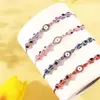 Venta Caliente Europea y Americana Set de 12 Piezas Pulsera Ojo de Diablo Pulsera Bohemia Tejida a Mano Pulsera de Cristal para Pareja
