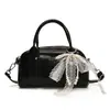 Bolso Boston Portátil de Moda de Gama Alta para Mujer 2025 Primavera Nuevo Estilo Coreano Nicho Elegante Bolso Cruzado Versátil