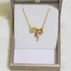 Collar de cobre con forma de lazo irregular con circonita cúbica microincrustada, con diseño de lazo en forma de corazón, un accesorio de moda ligero y versátil