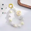 Nueva colección de otoño e invierno: Lindos dijes para teléfono de pompón pintados a mano estilo caricatura, accesorios de moda y exquisitos para bolso y llavero, perfectos como regalo
