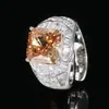 Otoño e invierno nueva joyería fondo de cobre chapado en oro diamante de alto carbono diamante cuadrado flor de hielo cobre incrustado princesa cuadrado anillo de lujo mujeres 10*10