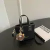 Bolso cruzado pequeño minimalista de moda transfronterizo para mujer, estilo retro 2026 nuevo, bolso cruzado diario para ir al trabajo, bolso tipo cubo tote casual
