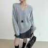 Nueva colección otoño/invierno 2026: Suéter de punto para mujer de corte holgado, estilo coreano, con cuello en V, diseñado para un look relajado y favorecedor, y fácil de combinar con otros atuendos