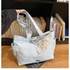 Bolso de Mano para Viajes Transfronterizos de Gran Capacidad Nueva Moda Primavera 2026 Versátil de Alto Valor Bolso Tote para Hombro o Axila