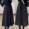 Falda de lana gris oscuro de cintura alta para mujer, estilo europeo de primavera y otoño, adelgazante, ajustada al cuerpo, falda midi de línea A tipo paraguas