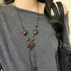 Collar con Colgante de Borla de Estrella Corazón Estampado de Leopardo Estilo Étnico Cadena de Suéter de Gama Alta Accesorio de Moda para Mujer Artículo de Moda Versátil