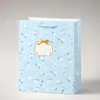 Bolsa de Tela con Estampado Floral Pequeño para Comercio Exterior, Bolsa de Papel de Regalo, Tarjeta Blanca Engrosada, Bolsa de Empaque con Flores Pequeñas Frescas, Bolsa de Compras Transfronteriza