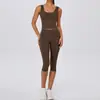 Nuevo conjunto de yoga estilo europeo y americano para mujer, ropa de fitness reductora de cintura, conjunto de dos piezas de alta elasticidad y ajuste ceñido para correr al aire libre y deportes