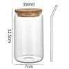 Traje de botella de vidrio transparente de grado alimenticio con tapa de bambú, directo de fábrica, se puede imprimir logo, producción, etiqueta de botella, empaque
