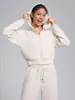 Conjunto deportivo para mujer de estilo americano, holgado, con capucha, para otoño e invierno, con pantalones de pierna ancha engrosados y forro polar, chaqueta corta con cremallera