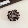 Goma de pelo rizada vintage con estampado de leopardo, alto atractivo estético, versátil para coletas bajas y peinados de moño, accesorio para el cabello