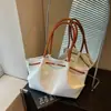 Bolsa de Gran Capacidad para Viajes Transfronterizos para Mujer 2026 Nuevo Primavera/Verano Versátil Bolso de Hombro/Axila Moda Bolso de Mano Tote