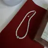 Colar de pérola de água doce forte Hetian jade feminino Jade luantong elegante moda executiva corrente de clavícula de pérola de água doce
