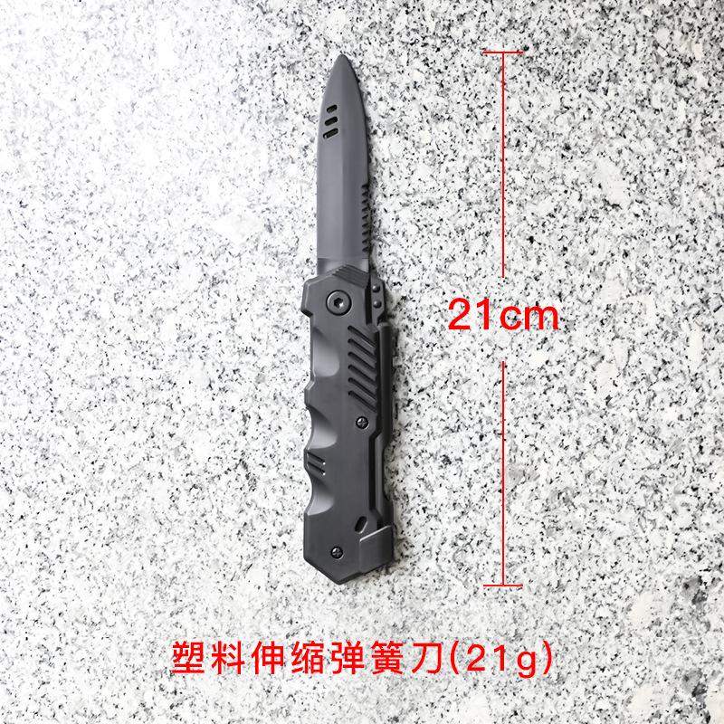 塑料伸缩弹簧刀.jpg