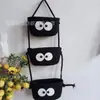 Cesta colgante de tres capas del fabricante Cesta de cuerda de algodón para Año Nuevo Decoración Cesta de almacenamiento de cosméticos de tres Ouli de dibujos animados Cesta para el hogar montada en la pared