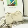 Atacado de fábrica nova bolsa feminina de couro bovino de primeira camada bolsa nuvem ombro portátil a tiracolo bolsa de mãe bolsa quadrada pequena
