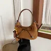 2026 Nova Bolsa de Mão Suede Pelúcia Outono Retrô Feminina de Alto Padrão Meilade para o Dia a Dia Ombro Único Transversal