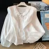 Camisa branca doce estilo francês com gola Peter Pan para mulheres, nova coleção de outono de 2026, com gravata borboleta e mangas compridas