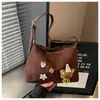 2026 Nuevo Estilo Versátil de Moda Tendencia Bolso Tote Gran Capacidad Moda Transfronteriza Hombro Único Cruzado Bolso para Mujer Bolso de Axila