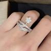 Anillo de lujo con forma de cometa de diamantes, moderno y ligero, con apertura superpuesta y circonitas de cinco puntas y una estrella brillante.