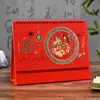 Calendário de Mesa Vermelho da China Hot Stamping Tendência Nacional Calendário de Mesa Atacado Diário Novo Calendário Vermelho Diário Festivo Vazado Calendário Mensal