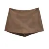 Conjunto de falda-pantalón de cuero color marrón melardo para mujer, nuevo modelo de principios de otoño 2026, minifalda bodycon ajustada de gamuza combinada con botas