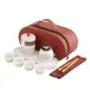 Juego de té de viaje traje portátil para exteriores juego de té kung fu taza rápida de cerámica empresa mayorista regalos publicitarios de negocios