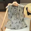 Em Estoque Verão 2025 Fina Chuva Orvalho Linho Artístico Estampa de Planta Redutora de Idade Sem Mangas Camisa de Amarrar Versátil