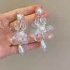Brincos de Franja de Pérola e Flor Transparente Celebridade da Internet Chunshan para Mulheres Retro Francês Brincos de Fada Elegantes para Mulheres 549