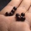 Venta al por mayor de fábrica ébano incrustado plata seda Xiangyun hoja grande sándalo rojo seda plata cuentas sueltas DIY Rey Kong estrella Luna accesorios