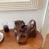 Bolso pequeño vintage de alta gama transfronterizo para mujer, nuevo bolso versátil de hombro y axila para el verano de 2026, bolso cruzado tipo dumpling