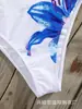 Suministro exclusivo de comercio electrónico transfronterizo desde la fábrica, al por mayor directo en stock, body de retazos de malla con estampado floral elegante y sexy