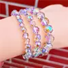 Venta al por mayor Yiwu artículos pequeños bola de flor cuentas pulsera de cristal femenina diy pulsera de cuentas para pareja estudiante pulsera arcoíris