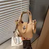 Bolso para Viajeros Transfronterizos para Mujer 2026 Nuevo de Moda Pequeño Bolso de Mano para el Trabajo Bolso Bandolera Cruzado de Hombro Único Bolso Cubo