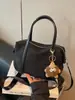 Bolsas bolsa Feminina 2026 Novo Estilo Bolsa de Mão Feminina Pequena Bolsa de Mão Tecido de Nylon Bolsa para Trabalho e Deslocamento