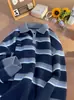 Suéter de punto con cuello polo y media cremallera a rayas retro japonés para hombre y mujer, estilo perezoso holgado de invierno, top de diseño de nicho