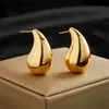 Pendientes de gota de agua dorados diseño nicho pendientes de alta gama exquisitos para el trabajo 2023 nueva moda versátiles temperamento femenino