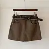 Falda corta retro versátil de línea A, nueva moda de cintura alta adelgazante que cubre la cadera anti-exposición, falda corta vaquera para mujer