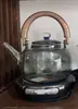 Estufa Eléctrica de Cerámica de Aleación de Gama Alta 1300W Aislamiento Térmico Doméstico Mini Estufa Ultradelgada Cafetera Automática para Té