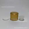 En stock suministro directo 18 dientes cubierta dorada doble tangente cubierta dorada tapa de botella de aceite esencial Tapa de plástico de aluminio tapa de botella de vidrio