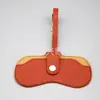2025 Nuevo Estilo Bolsa de Almacenamiento para Gafas Famosa de Internet Caja Portátil para Gafas de Sol Bolsa Caliente para Gafas Cubierta Protectora Anti-presión Bolsa Colgante