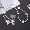 Estilo perfumado pequeno transfronteiriço Pérola Celular Pescoço Pendurado Corda Internet Popular Couro Vestindo Corrente de Celular Crossbody Cadeia Acessórios para Mulheres