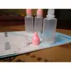 Botella de 0 ojos sin aprobación 30605 unidades 25g Litian 31 gotas botella pequeña de leche botella para dividir cuchara universal para dividir