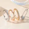 Anillo de Luz de Zirconia Incrustada en Oro Real Chapado en Cobre Transfronterizo Europeo y Americano Lujo Ligero Sensación de Alta Gama Anillo para el Dedo Joyería de Mano Versátil Fabricante Venta al por Mayor en Stock