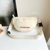 Bolsa Pequeña Súper Popular Ins para Mujer 2025 Nuevo Estilo de Moda Bolso Versátil de Nylon Estilo Fresco de Verano Bolso Cruzado para Niños