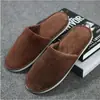 Pantuflas Desechables Rayadas de Coral Fleece Engrosadas Antideslizantes al por Mayor de Fábrica para Hoteles, Casas de Huéspedes y Posadas, Artículos Portátiles Populares de Venta Caliente