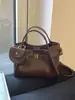 Bolsos de nicho súper populares transfronterizos para mujer 2026 nuevo estilo bolso cruzado tipo cubo bolso pequeño de alta gama exquisito para salir