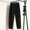 Foto real estúdio minimalista retrô estilo japonês calça casual workwear única para mulheres, calça pantalona Harem de cintura alta elástica, Tencel da moda