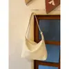 Bolsa Hobo de Couro Macio Trançado Vintage de Nicho para Ombro Modelo Novo 2026 com Acabamento de Luxo, Bolsa de Mão e Bolsa de Ombro Simples para o Dia a Dia